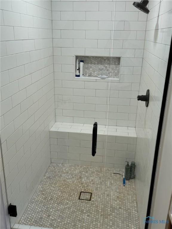 full bath featuring a stall shower