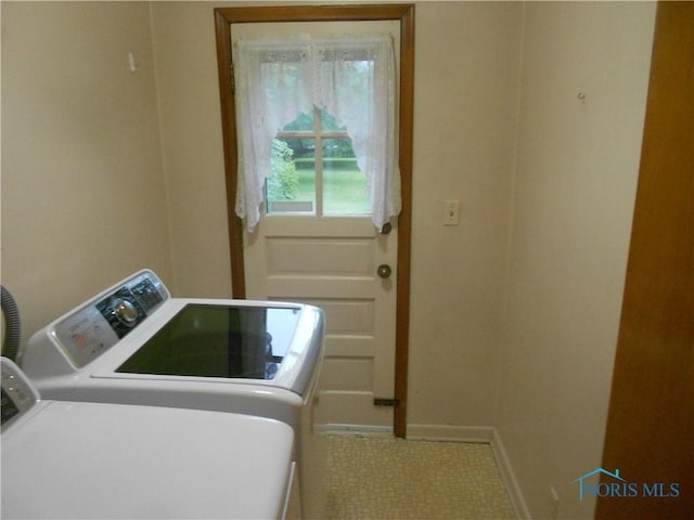 laundry area with washer and clothes dryer