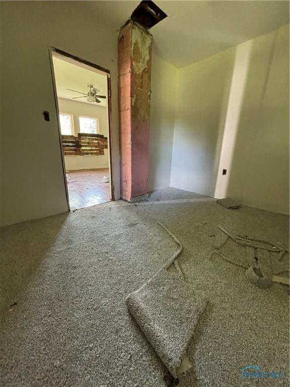 unfurnished room featuring carpet flooring