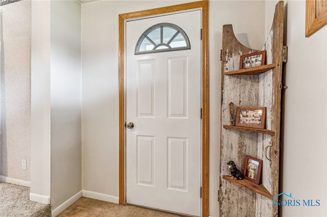 foyer with carpet