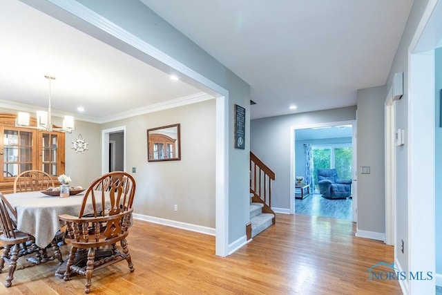 dining area featuring stairs, recessed lighting, light wood-style flooring, and baseboards