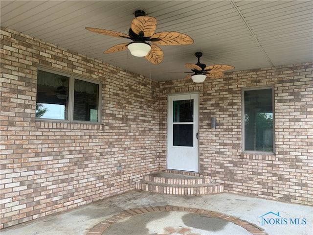 view of patio / terrace featuring ceiling fan