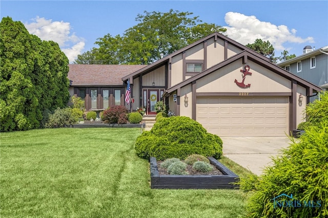 tudor house with a garage and a front yard