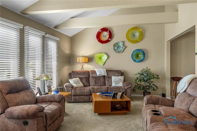 living room featuring carpet flooring and lofted ceiling with beams