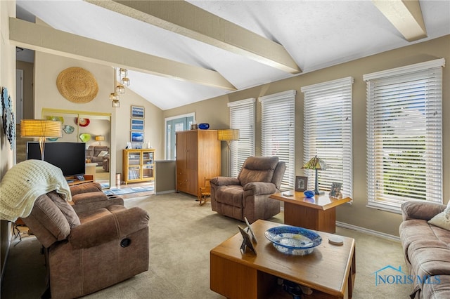 carpeted living room with vaulted ceiling with beams