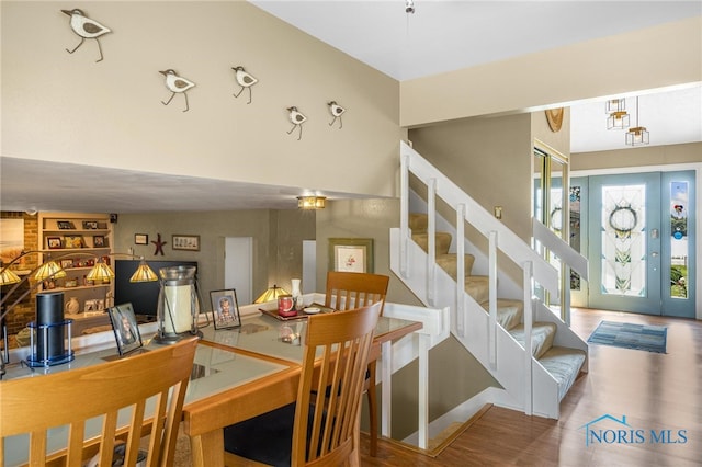 dining area with hardwood / wood-style floors