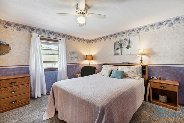 bedroom featuring ceiling fan and carpet flooring