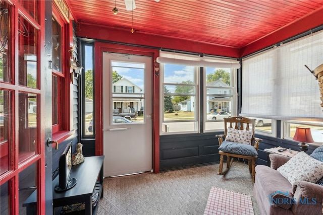 sunroom with wood ceiling