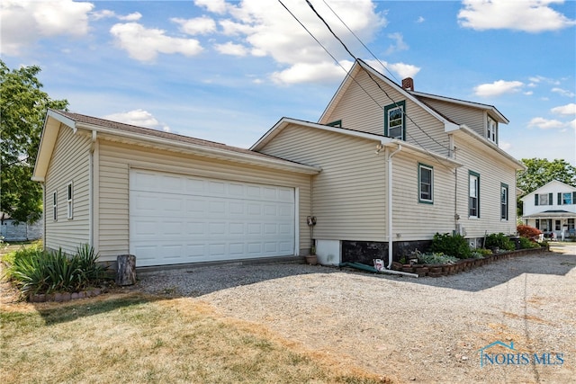 view of home's exterior featuring a garage