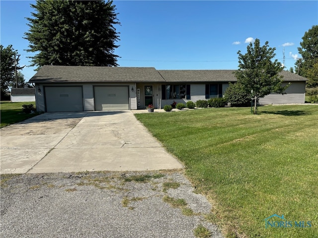 single story home with a front lawn and a garage