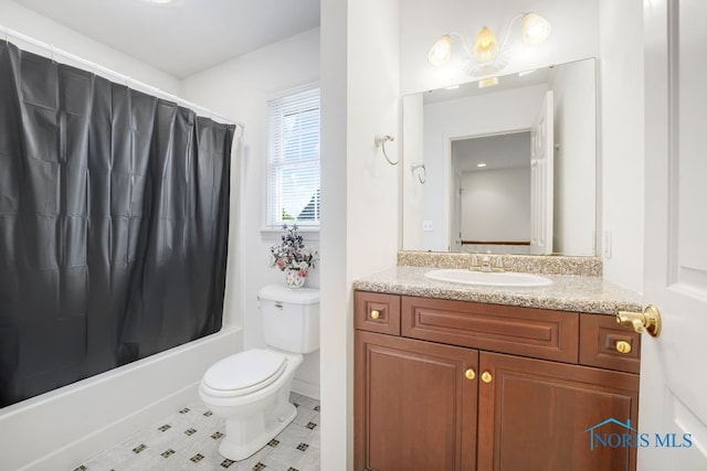 full bathroom featuring tile patterned floors, toilet, shower / bathtub combination with curtain, and vanity