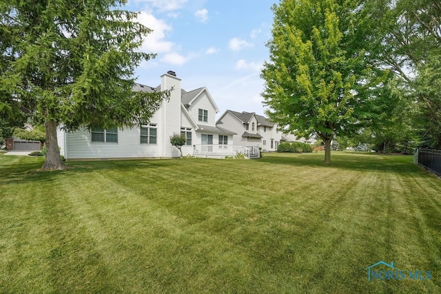 view of yard with a deck