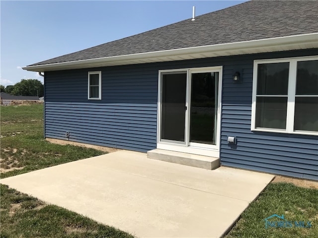 rear view of property with a patio area