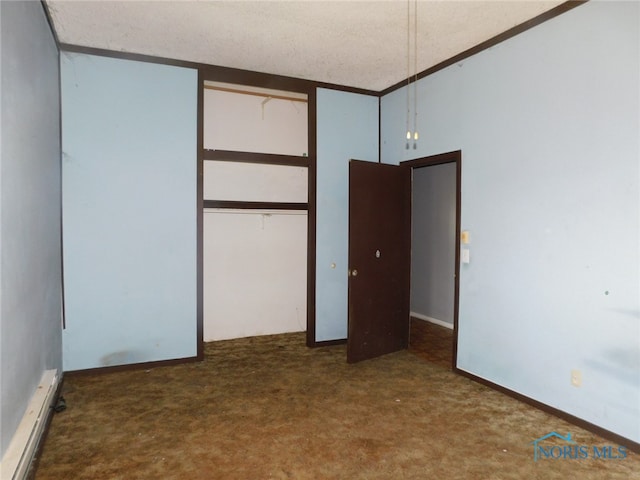 unfurnished bedroom featuring a closet, a textured ceiling, and carpet floors