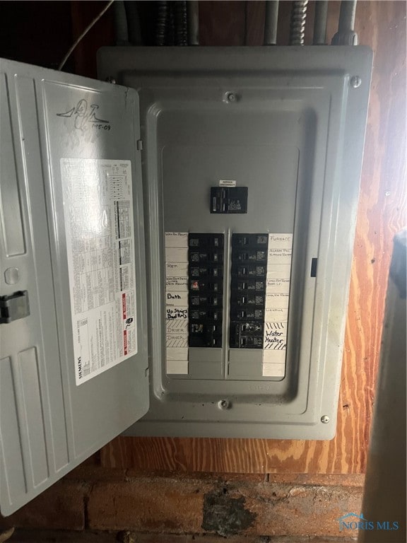 utility room featuring electric panel