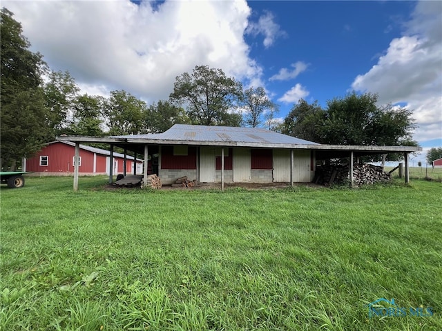 exterior space with a front yard