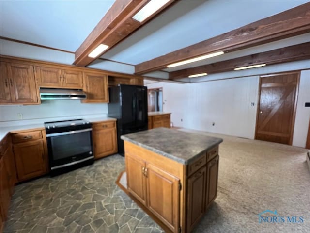 kitchen with black fridge, ventilation hood, range with electric stovetop, a kitchen island, and beamed ceiling