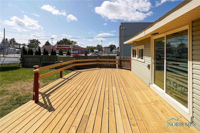 wooden terrace featuring a trampoline