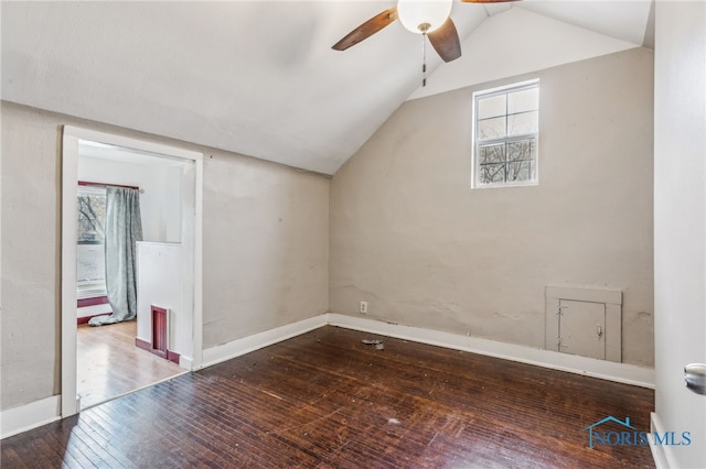 bonus room with ceiling fan, hardwood / wood-style floors, and vaulted ceiling