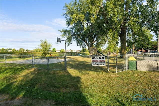 surrounding community with a yard