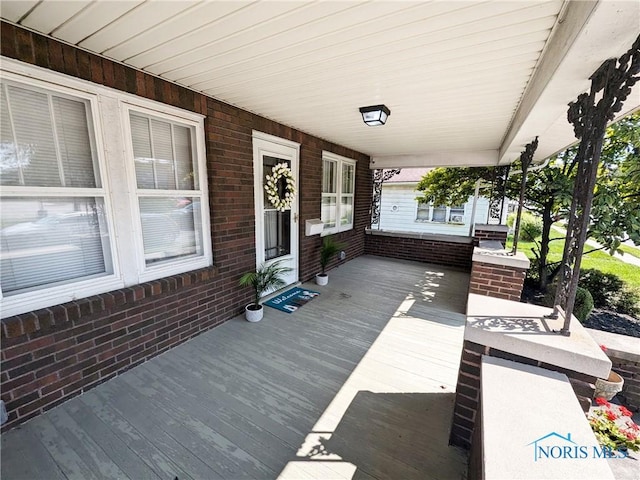 wooden terrace with covered porch