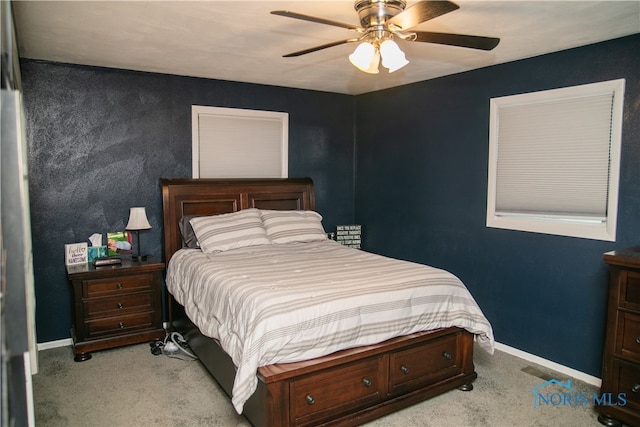 bedroom featuring ceiling fan and carpet floors