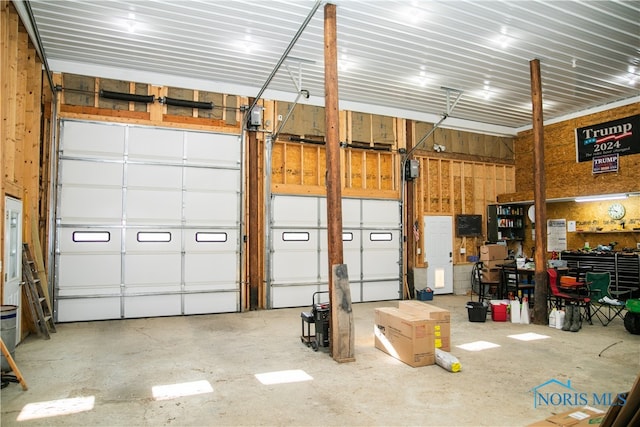 garage with a workshop area