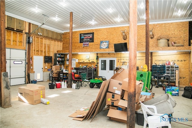 interior space featuring a workshop area and concrete flooring