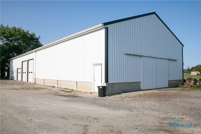 view of outbuilding featuring a garage