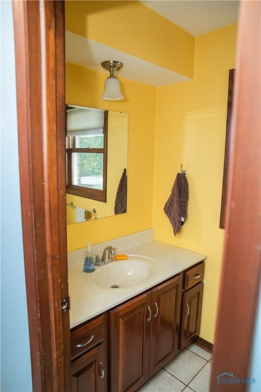 bathroom featuring tile patterned floors and vanity