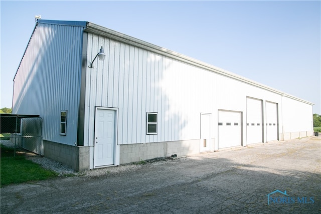 exterior space with a garage