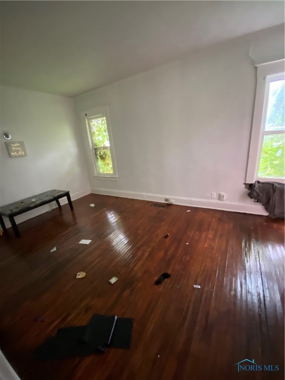 spare room featuring hardwood / wood-style flooring