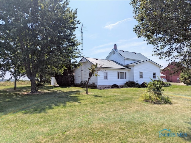 exterior space featuring a front yard