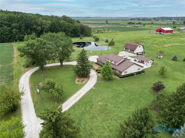 bird's eye view featuring a water view and a rural view