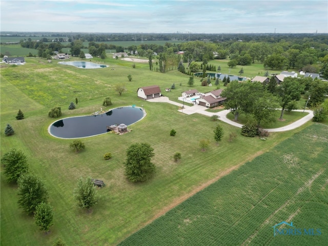 bird's eye view featuring a water view and a rural view