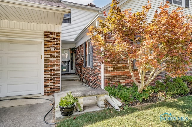 entrance to property with a garage