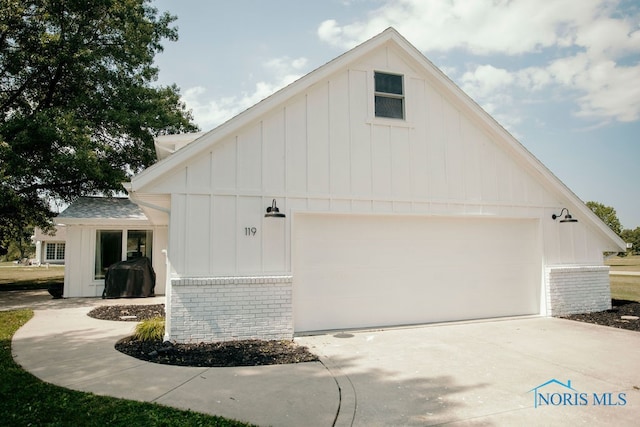 view of property exterior featuring a garage