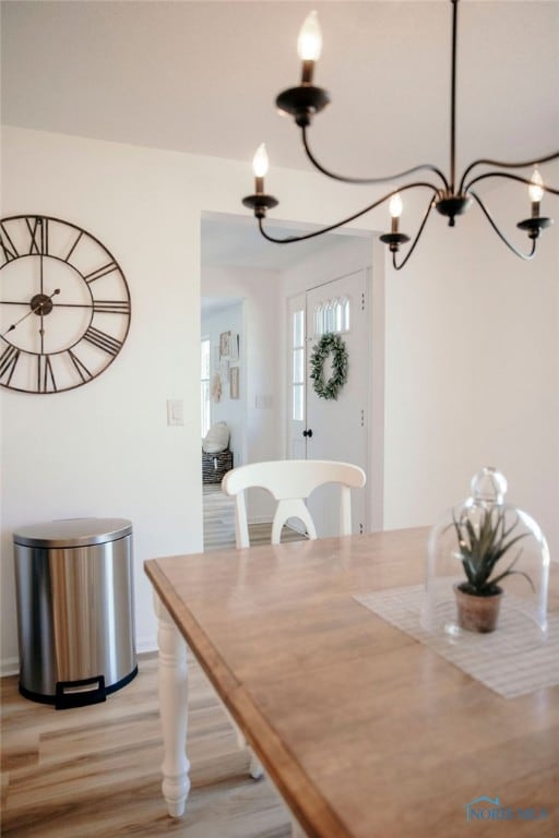 dining space with light wood-type flooring