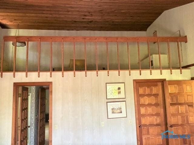 interior space with vaulted ceiling and wood ceiling