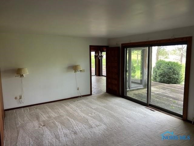 view of carpeted spare room