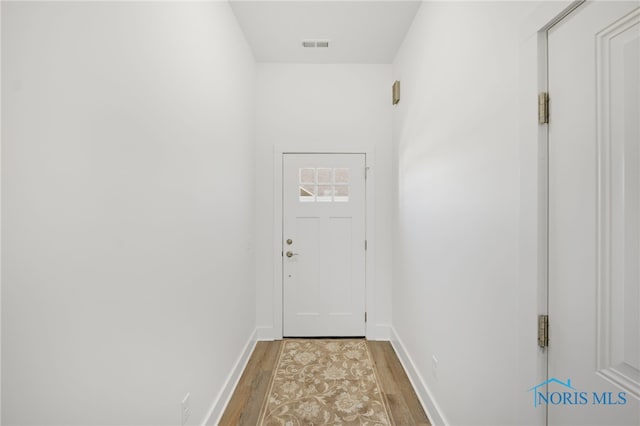 doorway featuring light hardwood / wood-style floors