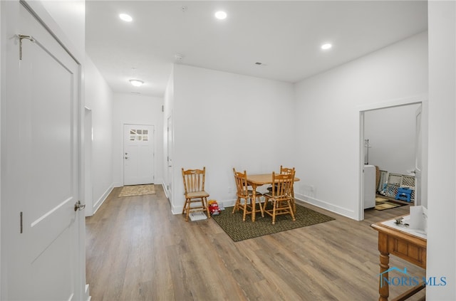 dining room with light hardwood / wood-style flooring