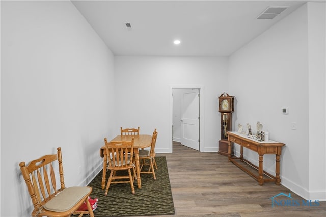 dining space featuring light hardwood / wood-style floors