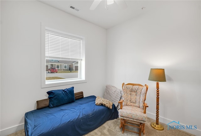 bedroom with ceiling fan and carpet floors