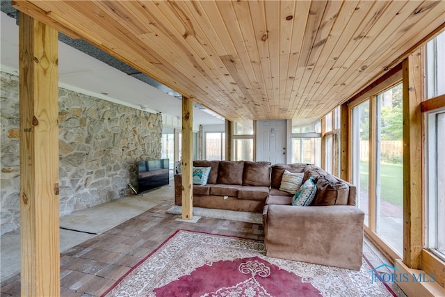 sunroom featuring wood ceiling