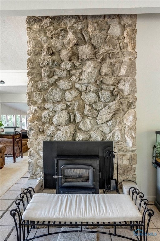 room details with tile patterned flooring and a fireplace