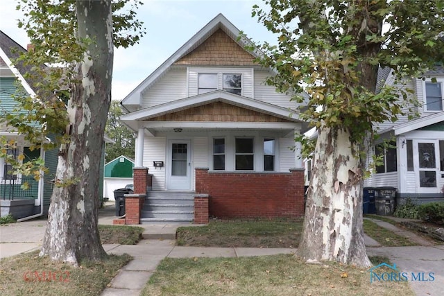 bungalow-style home featuring covered porch