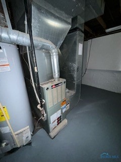 utility room with gas water heater