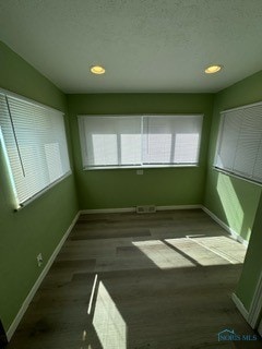 interior space featuring dark hardwood / wood-style floors