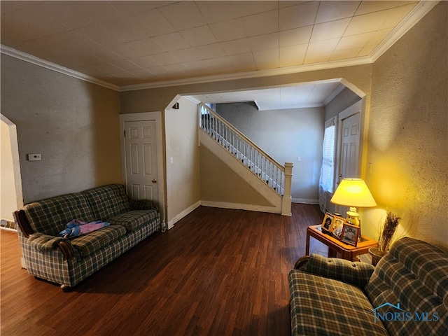 living room with crown molding and dark hardwood / wood-style flooring